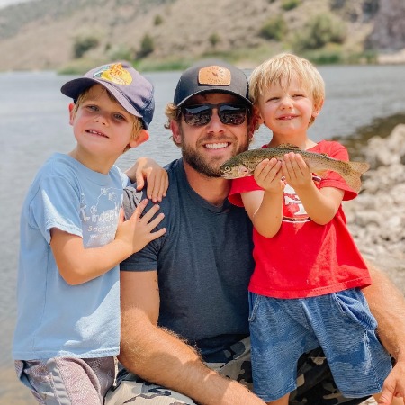 Max Thieriot fishes with his two sons.